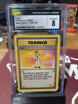 Lass Pokemon (2000) Base Set 2 104/130 Graded CGC 8 - Image 1