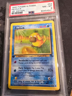 1999 Pokemon Fossil Psyduck 1st Edition 53/62 PSA NM-MT 8 - Image 1