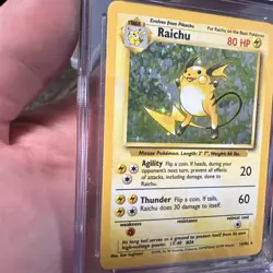 1999 POKEMON BASE SET #14 RAICHU-HOLO CGC 8 NM-M - Image 3