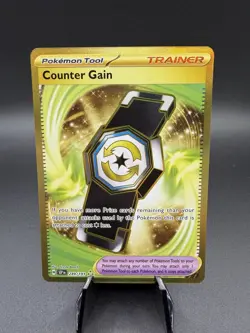 Pokemon TCG Counter Gain 249/191 Surging Sparks Hyper Rare Gold Trainer - Image 1