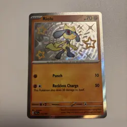 Pokemon Card TCG - Riolu 173/091 - Paldean Fates - Baby Shiny Rare - NM - Image 1