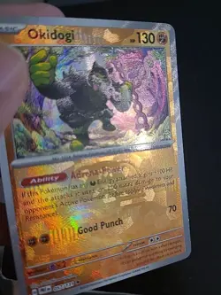 Okidogi (Master Ball Pattern) - 057/131 - Prismatic Evolutions Pokemon Holo NM - Image 3