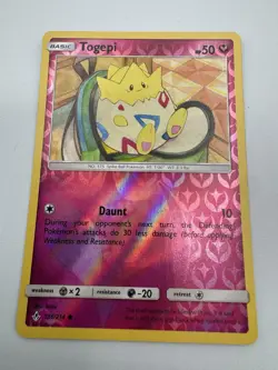 Togepi - 136/214 - Reverse Holo Common - Unbroken Bonds - Pokemon Card NM - Image 1