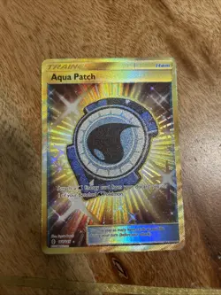 Aqua Patch - 161/145 - Pokemon Guardians Rising Sun & Moon Secret Rare Card MP - Image 1