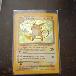 Pokemon TCG Base Set Raichu Holo Card 14/102 by Nintendo Wizards 1999 - Image 1
