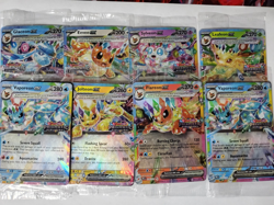 8 Prismatic Evolutions sealed Stamped Promos, Eevee, Leafeon, Sylveon, Jolteon+ - Image 1