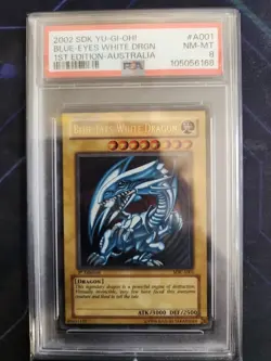 Yugioh | Ultra Rare 1st Edition PSA 8 | Blue-Eyes White Dragon SDK-A001 SDK-001 - Image 1