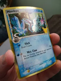 Pokemon TCG Celebrations Mimikyu Delta Species SWSH136 Black Star Promo NM - Image 1
