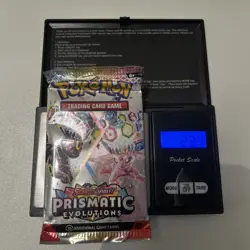 Prismatic Evolutions Booster Pack Pokemon - Heavy 23.1g - Image 1