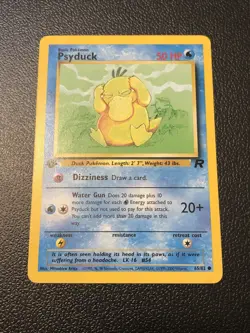 Psyduck 65/82 Team Rocket 1st Edition Pokemon Card In Mint Condition - Image 1