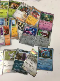 Pokemon Card Bundle with Tins, Holos, Rares, and EX Cards 100+ Cards Collection - Image 3