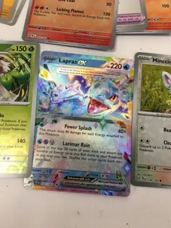 Pokemon Card Bundle with Tins, Holos, Rares, and EX Cards 100+ Cards Collection - Image 4