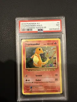 2016 POKEMON XY EVOLUTIONS COSMOS-TOYS R US #9 CHARMANDER-HOLO PSA 7 - Image 1