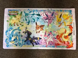 POKEMON PRISMATIC EVOLUTIONS - SPECIALTY PREMIUM COLLECTION SPC PLAYMAT - Image 1