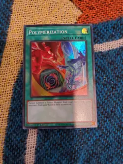 Yugioh Bonanza - Polymerization (HERO Art) - Super Rare - RA03-EN051 - Image 1