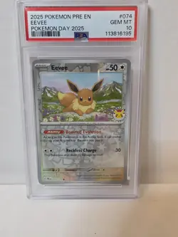 PSA 10- Eevee - (Pokemon Day 2025) (Reverse Cosmos Holo) 074/131-US Seller! - Image 1
