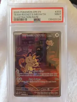 Team Rockets Meowth- IR- 2025 Pokemon DRI EN #203 PSA MINT 9 - Image 1