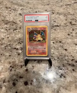 1999 Pokemon Base Set Charizard Holo #4 PSA 7 NM – Vintage WOTC - Image 1