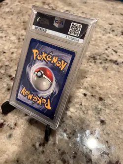 1999 Pokemon Base Set Charizard Holo #4 PSA 7 NM – Vintage WOTC - Image 4