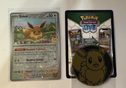 Prismatic Evolutions Eevee 074/131 Pokemon Day 2025 Reverse Cosmos Promo w/COIN! - Image 1