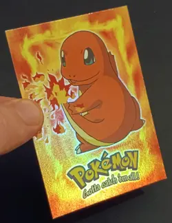 Rainbow Foil Charmander E4 Card Topps Pokemon The First Movie - Image 1