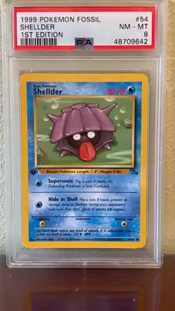 1999 Pokemon Fossil 1st Edition Shellder #54 PSA Graded 8 NM-MINT - Image 1