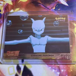 #27 STEALING POKEMON Topps Pokemon Card Mewtwo Strikes Back Blue Logo HOLO FOIL - Image 1