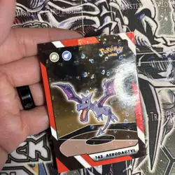 2025 Pokemon Kanto Full House - Circles Holo Common - Aerodactyl #142 - Image 2