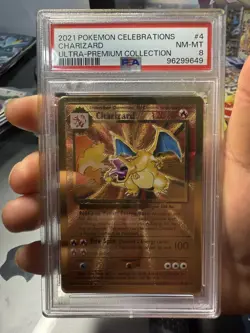 PSA 8 - 2021 Pokemon Celebrations UPC CHARIZARD Gold Metal Card #4 - Image 1