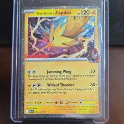 Team Rocket's Zapdos 070/182 GameStop Exclusive Holo Promo Pokemon TCG Card - Image 1