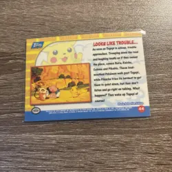 1999 Topps Pokemon First Movie Looks Like Trouble Silver Foil #44 Black Logo - Image 2