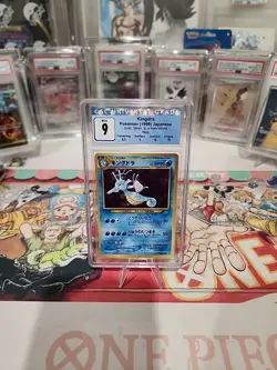 CGC 9 MINT Kingdra Holo JAPANESE (1999) Gold, & Silver To A New World #230 - Image 1