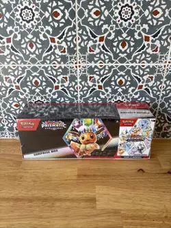 Sam’s Club Pokemon Prismatic Evolutions Surprise Boxe & Booster Bundle Smal Tear - Image 1