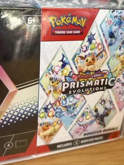 Sam’s Club Pokemon Prismatic Evolutions Surprise Boxe & Booster Bundle Smal Tear - Image 2