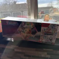 Sam’s Club Pokemon Prismatic Evolutions Surprise Box & Booster Bundle - Image 1
