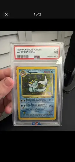 1999 Pokemon Jungle Vaporeon-Holo Unlimited PSA 7 English 12/64 - Image 1