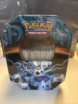 Pokemon Thundurus Tin Full of Bulk Cards From Various Sets - Image 1