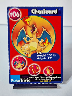 1999 Charizard #06 PokeTrivia Mewtwo Strikes Back Pokemon The First Movie Card - Image 1
