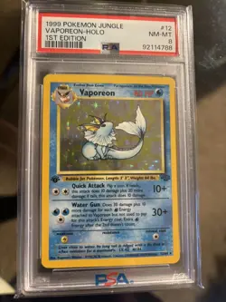 1999 Pokemon Vaporeon 1st Edition Jungle 12/64 Holo Rare PSA 8 - Image 1