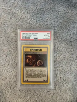 1999 Pokemon 1st Edition Fossil # 62 Mysterious Fossil Trainer PSA 10 GEM MINT!! - Image 1
