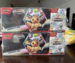 Lot Of 2 Sam’s Club Pokemon Prismatic Evolutions Surprise Boxe & Booster Bundle - Image 1