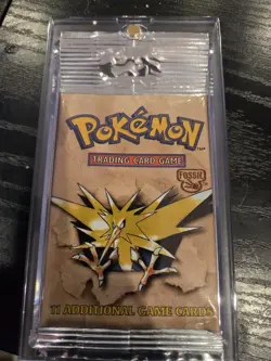 Pokemon Fossil Booster Pack – Zapdos – Sealed – 20.85g – WOTC - with Hard Case - Image 1