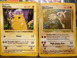 Vintage Pokemon Lot – Base Set Pikachu, Fossil Hitmonlee Holo, EX Sandstorm Gold - Image 1