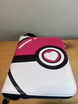 Pokemon card binder for Pokemon cards, 50 sleeves, 9.5x7" pink/white cover - Image 1