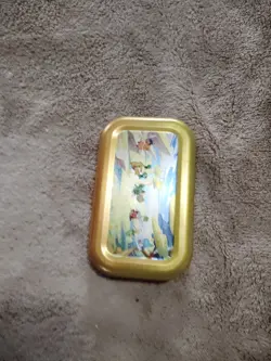tin containing 40 cards ranging from trainers energy pokemon plus a sticker - Image 2