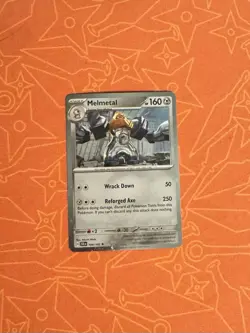 Melmetal 104/142 Stellar Crown Cosmos Holo Blister Exclusive Pokemon TCG - Image 1