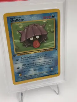 1999 POKEMON FOSSIL Trading Card SHELLDER #54/62 1ST EDITION graded slab PSA 8 - Image 4