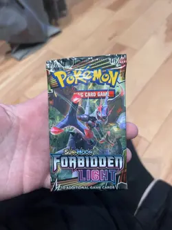 Pokemon TCG Sun & Moon-Forbidden Light Booster Pack - Image 1