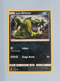 2019 Alolan Grimer 127/236 - Unified Minds - NM/MINT Pokemon TCG - Image 1