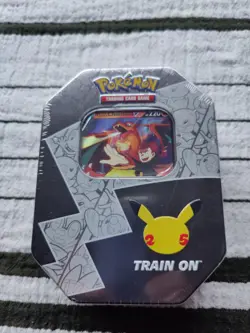 Pokemon TCG Celebrations Lance's Charizard Tin (Factory Sealed) - Image 1